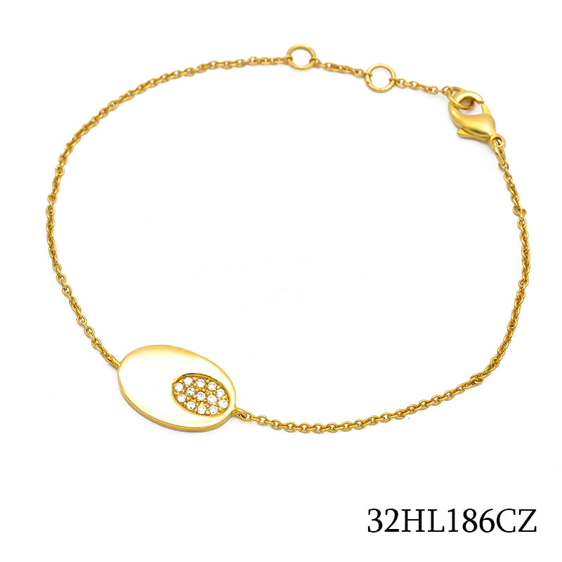 18K gold plated polished oval station bracelet with off-center clear pavé cubic zirconia accent, SKU 32HL186CZ